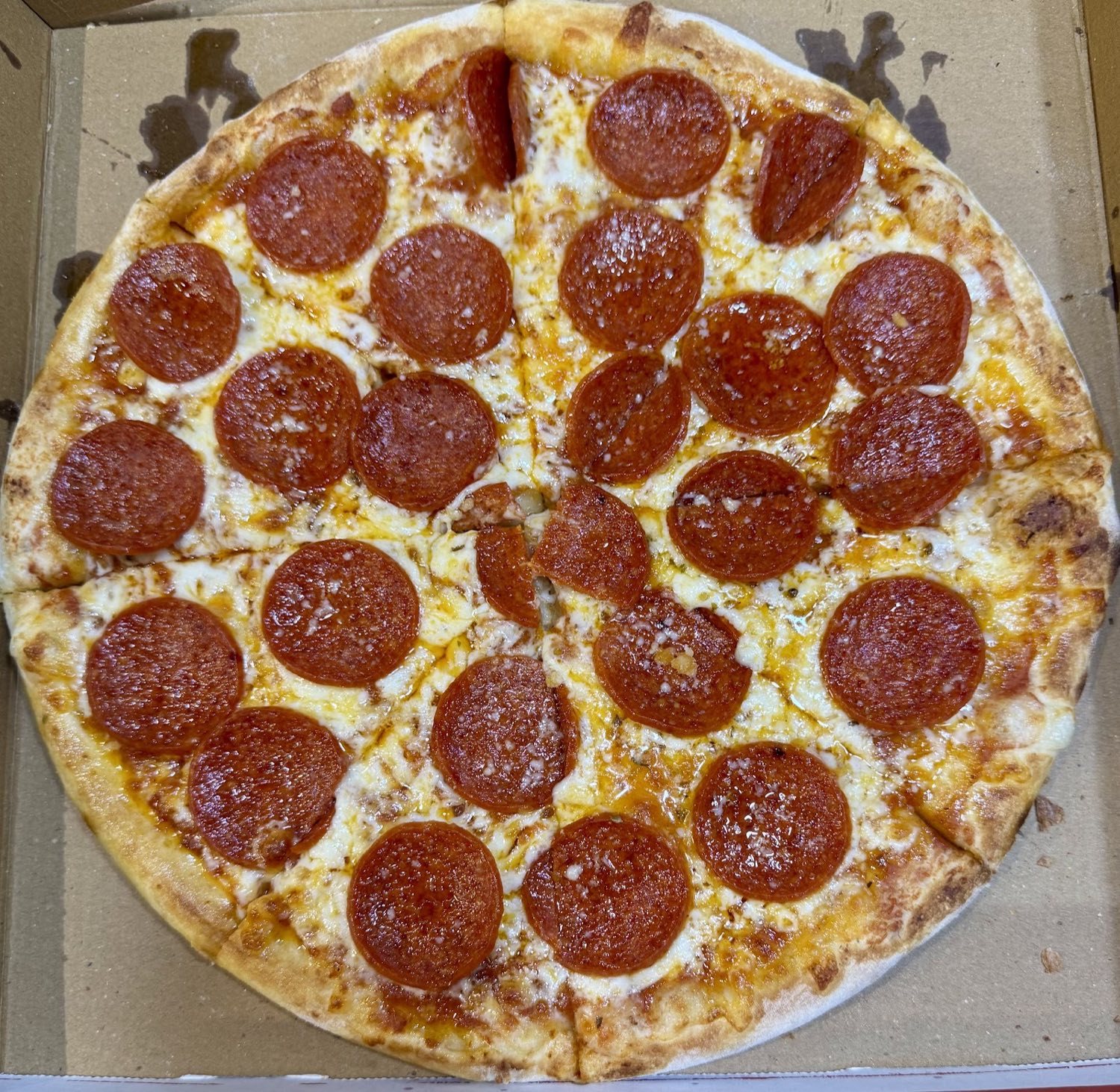 Wood-fired pepperoni pizza